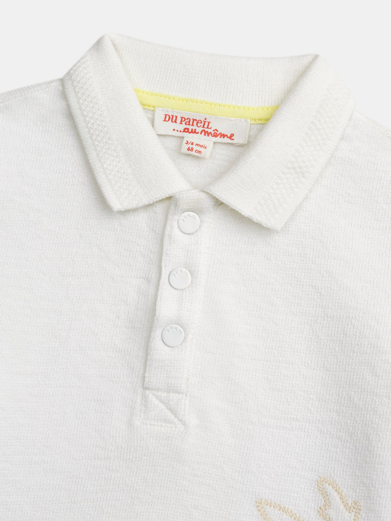 Polo ecru com bordado de palmeira para bebé rapaz