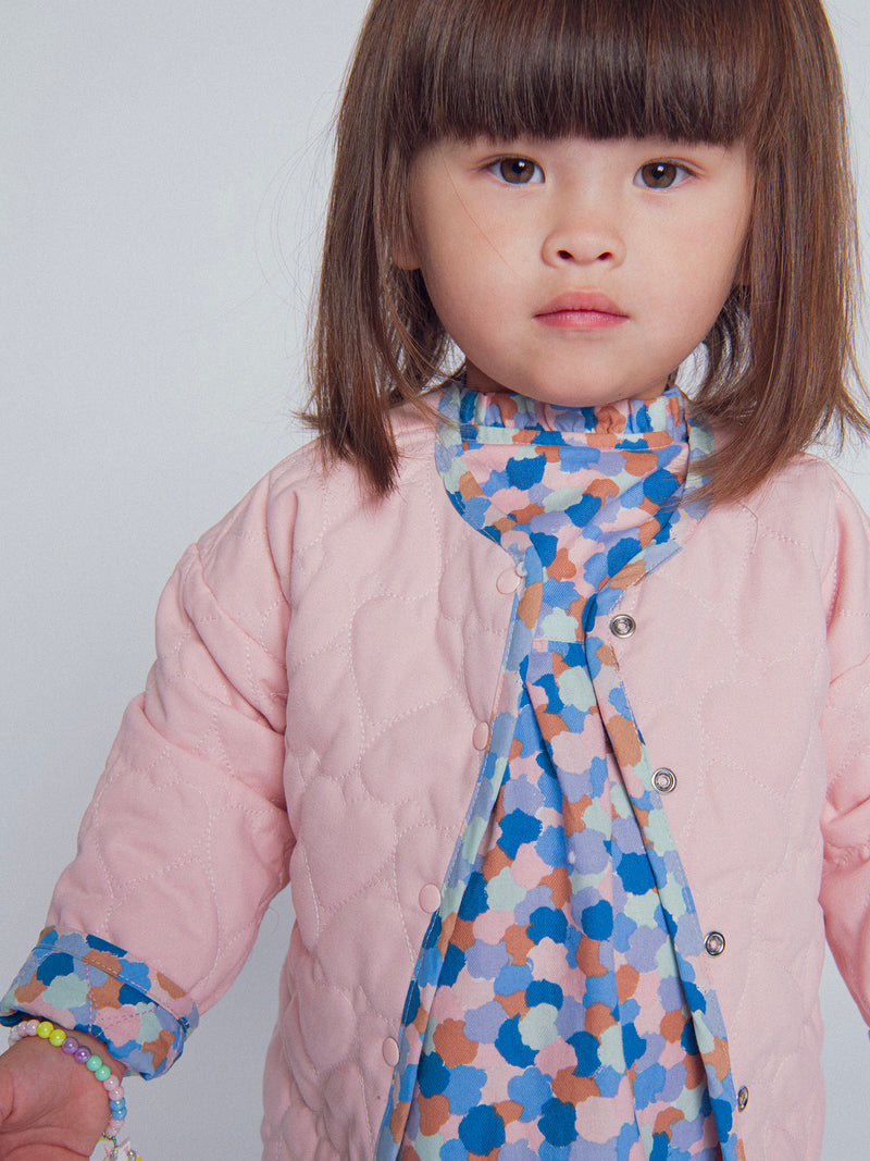 Cardigan reversível acolchoado rosa com corações para menina