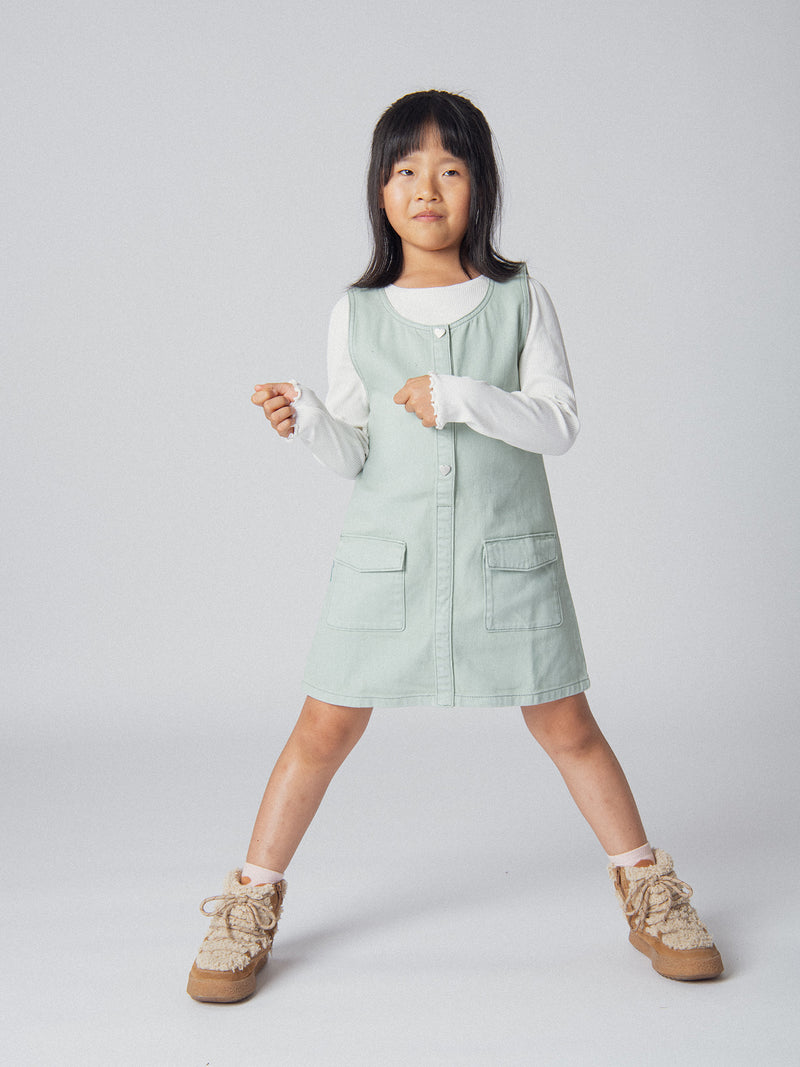 Robe verte sauge à poches pour fille