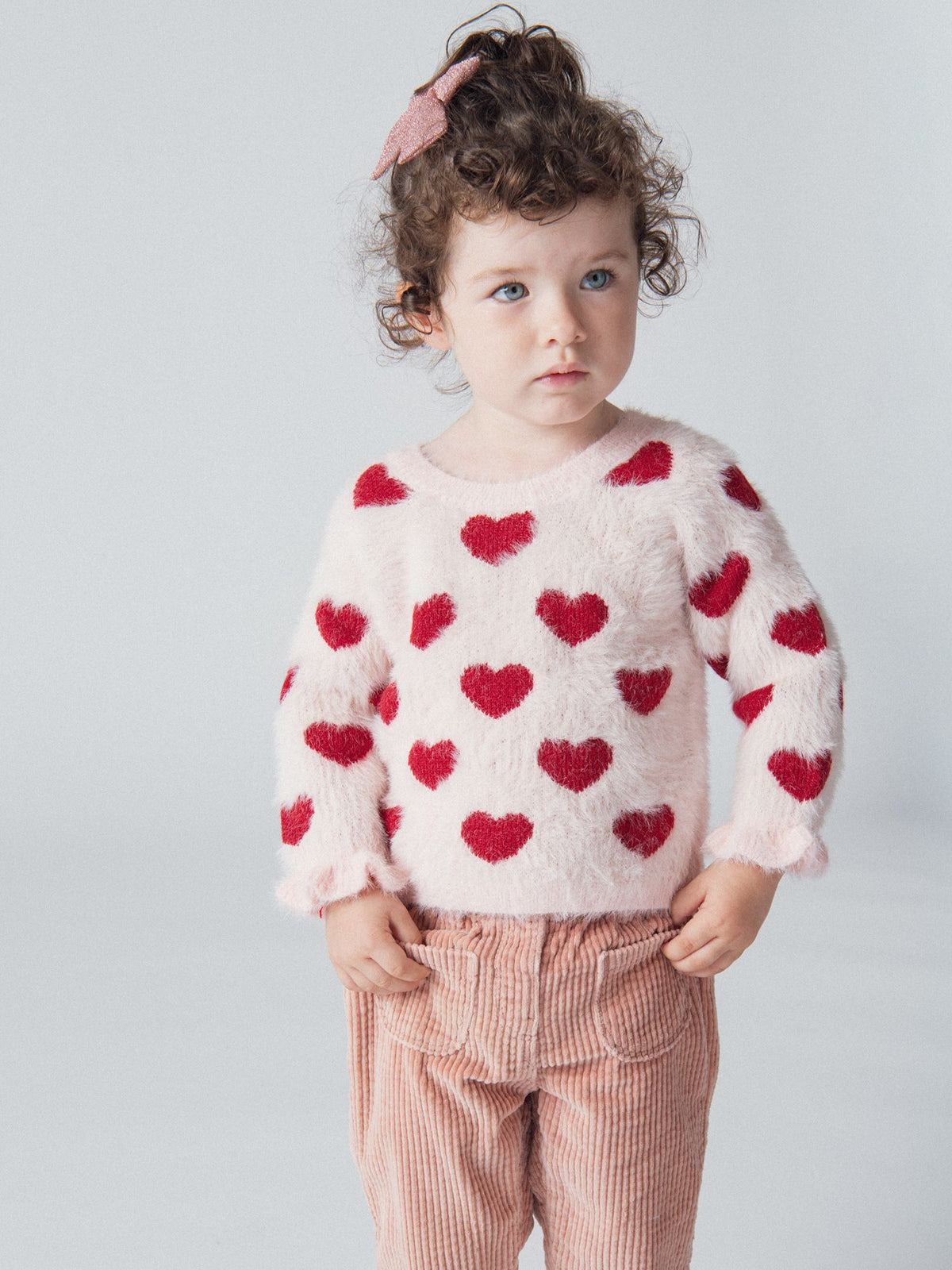 Pull rose craie à motif cœurs pour bébé fille