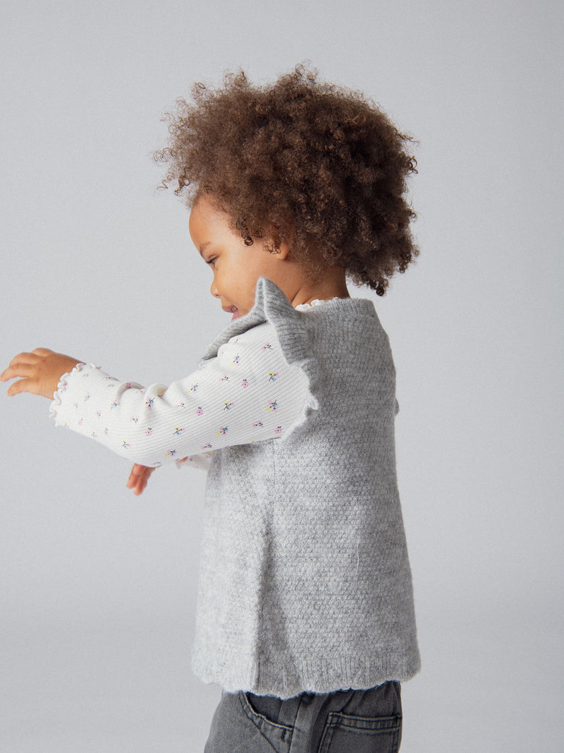 Gilet sans manches en maille texturée à volants pour bébé fille