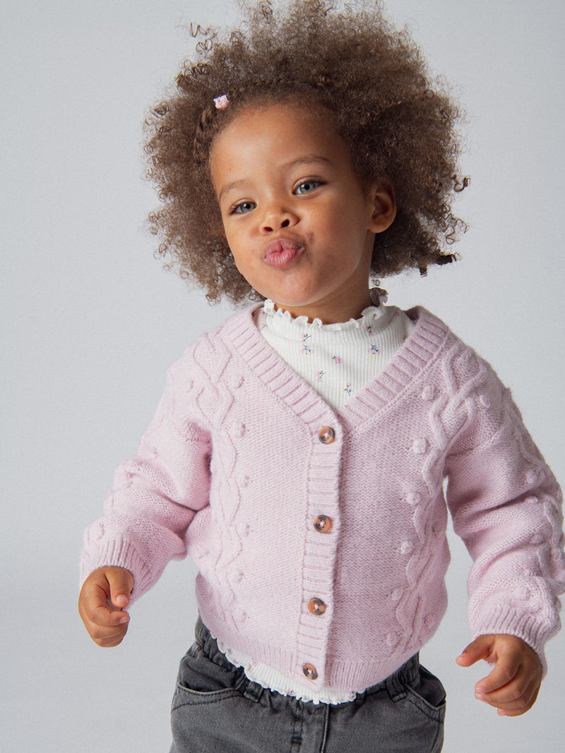 Cardigan en maille torsadée rose poudré pour bébé fille