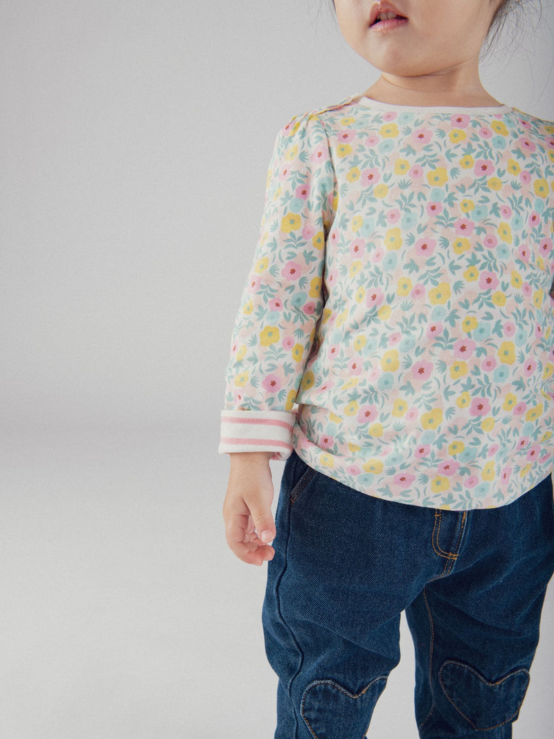 T-shirt reversível com motivo de flores pastel para bebé menina