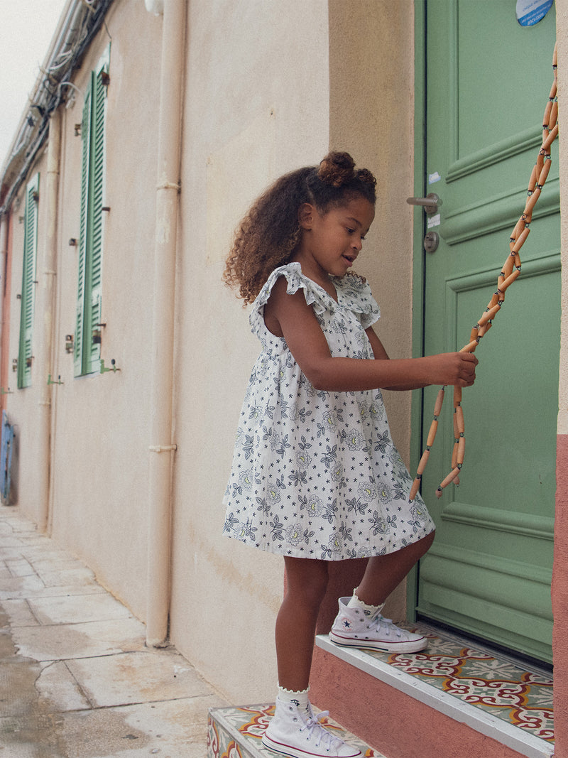 Vestido ecru com padrão floral para meninas