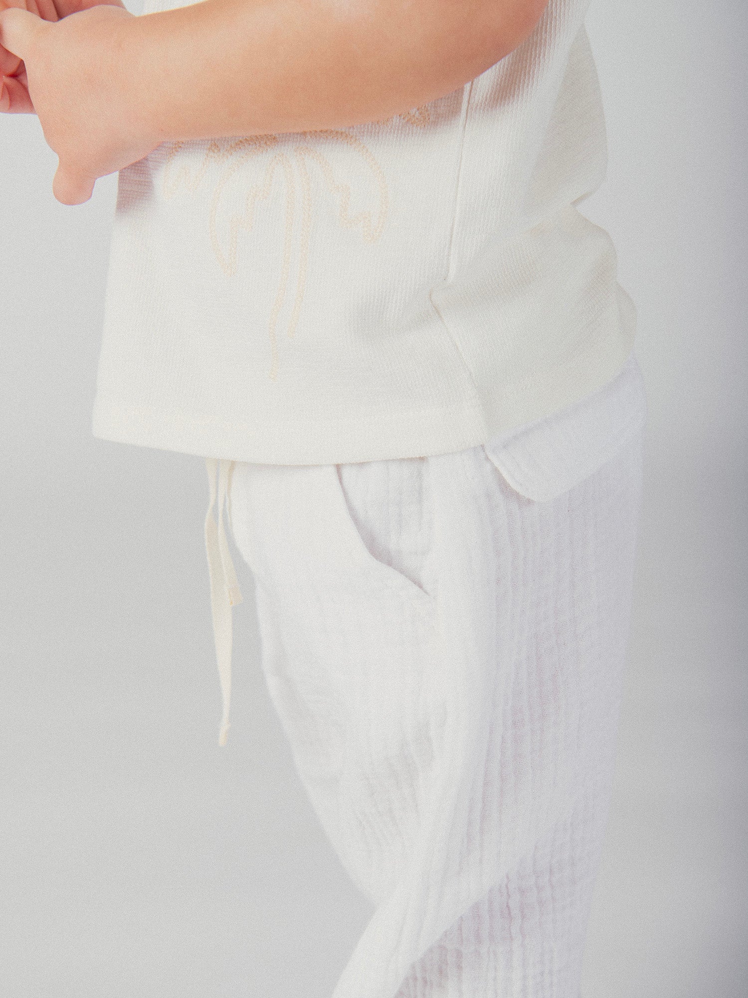 Pantalon écru avec revers ajustables pour bébé garçon