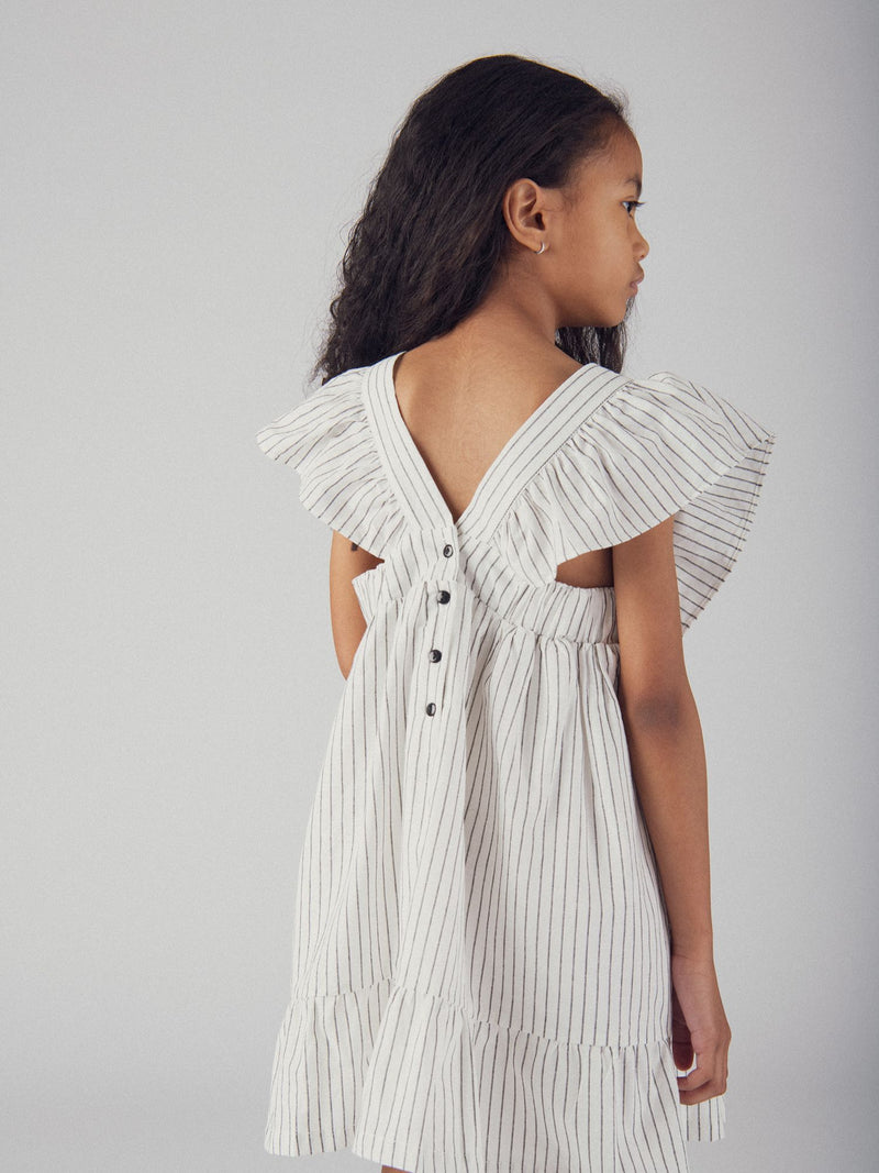 Vestido ecru com bordados de flores para meninas