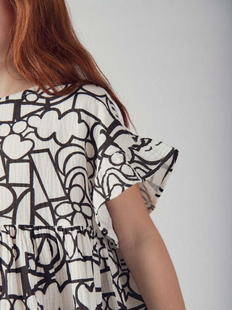 Vestido écru com estampado gráfico para meninas