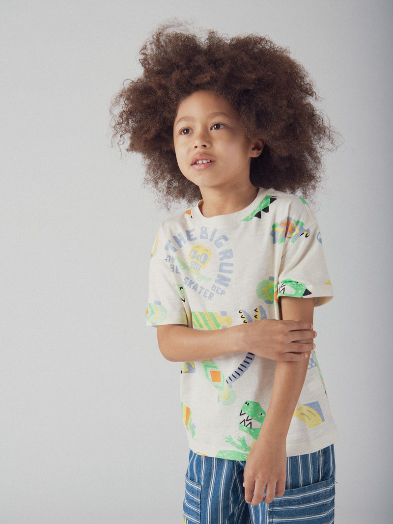T-shirt ecru com estampa de dinossauro para rapazes