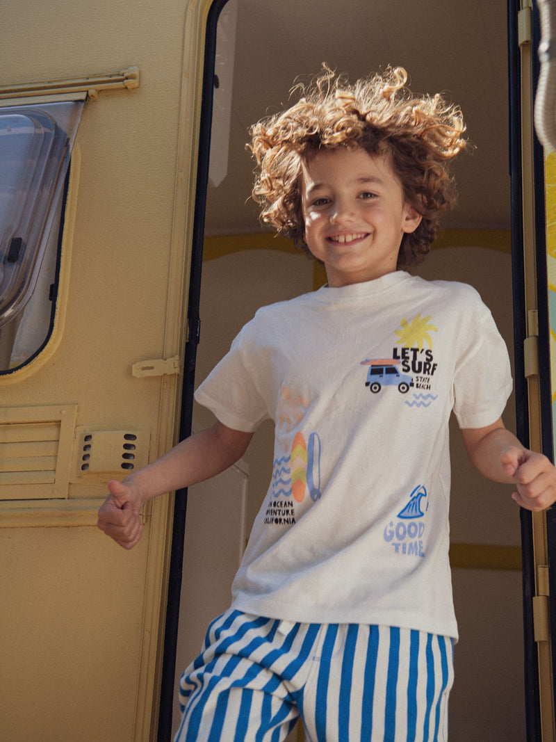 T-shirt ecru com animações de praia para meninos