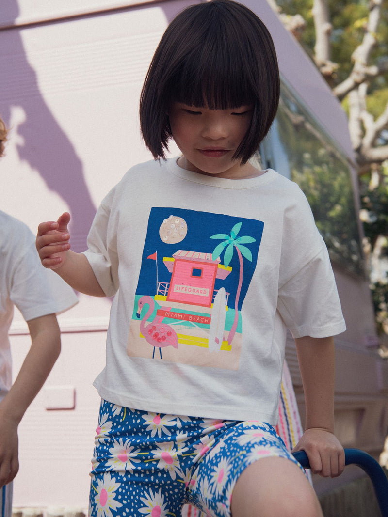 T-shirt ecru com animação de praia para meninas
