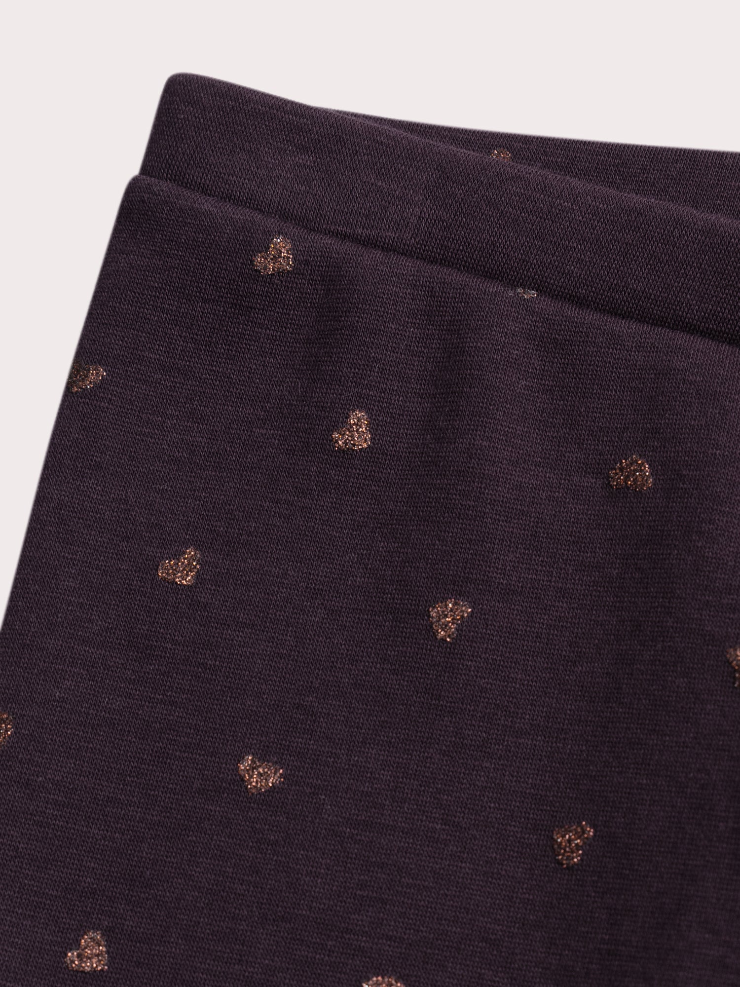 Leggings roxos com estampado de coração e glitter