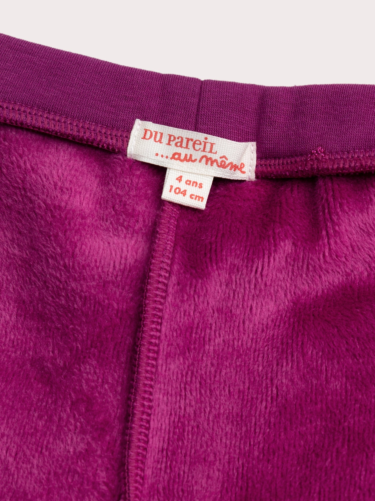 Legging rose imprimé coeur pailleté