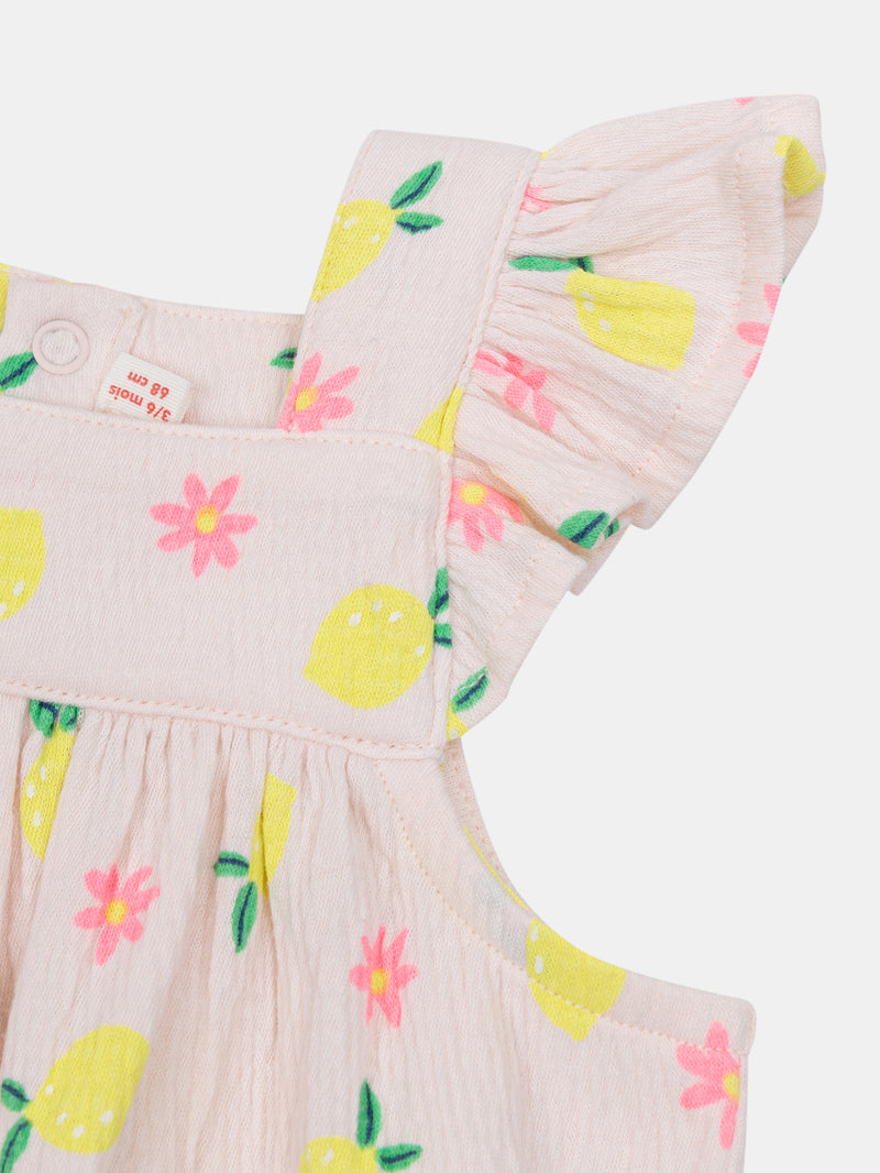 Macacão rosa com padrão de limões e flores para menina