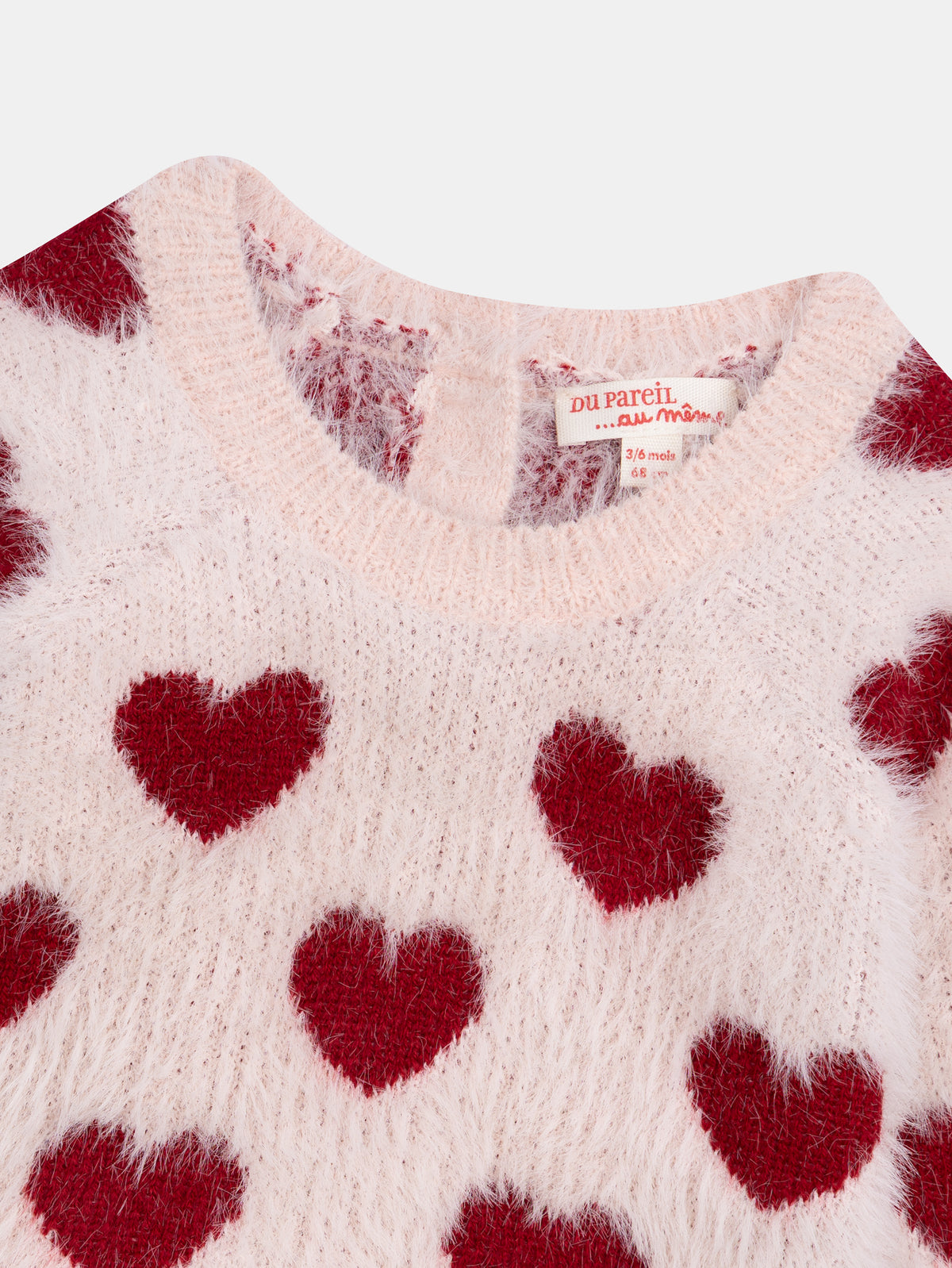 Pull rose craie à motif cœurs pour bébé fille