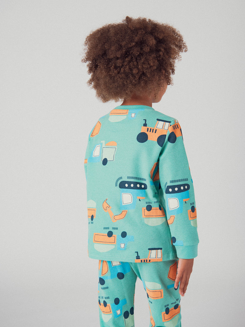 O pijama verde de 2 peças com estampa "Canteiro" para bebé menino
