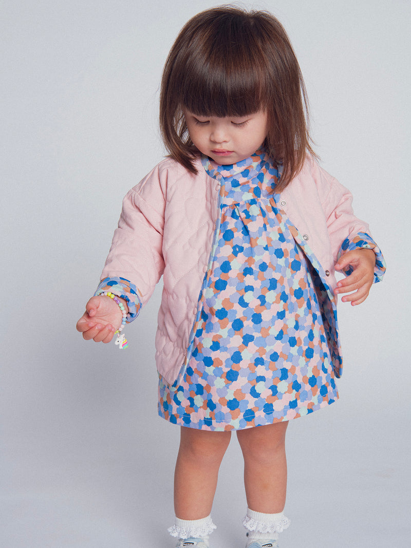 Cardigan reversível acolchoado rosa com corações para menina