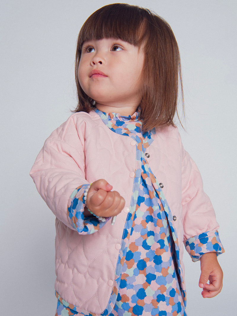 Cardigan reversível acolchoado rosa com corações para menina