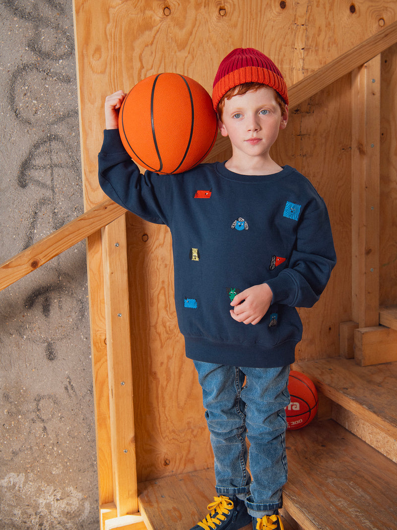 Sweatshirt azul-marinho com bordados de cabeças de cães para menino
