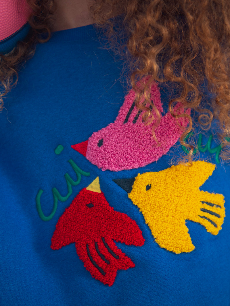 Sweatshirt azul com animação de pássaros para meninas