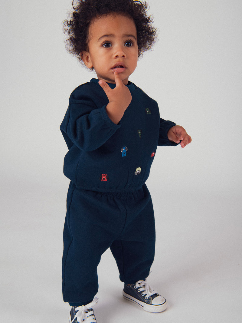Conjunto de sweatshirt e calças azul marinho "ARTY SCHOOL" para menino bebé