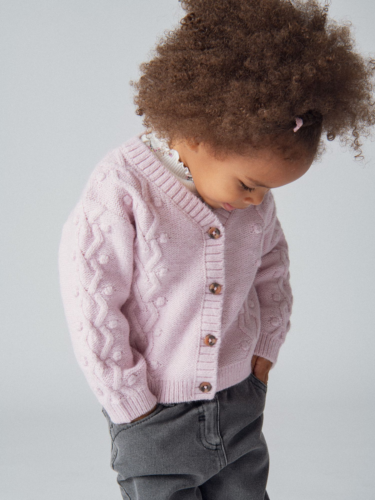 Cardigan de malha torcida rosa para menina