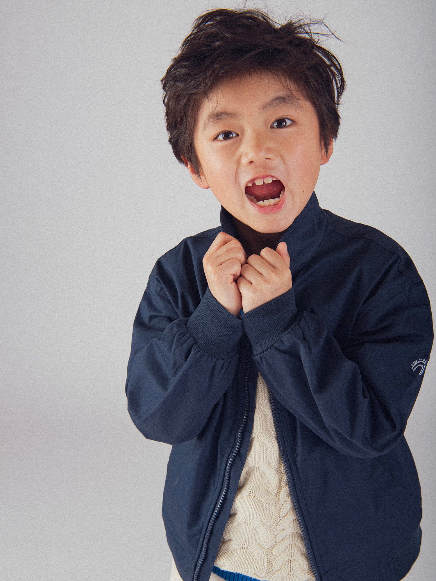Veste bleu foncée à poches pour garçon