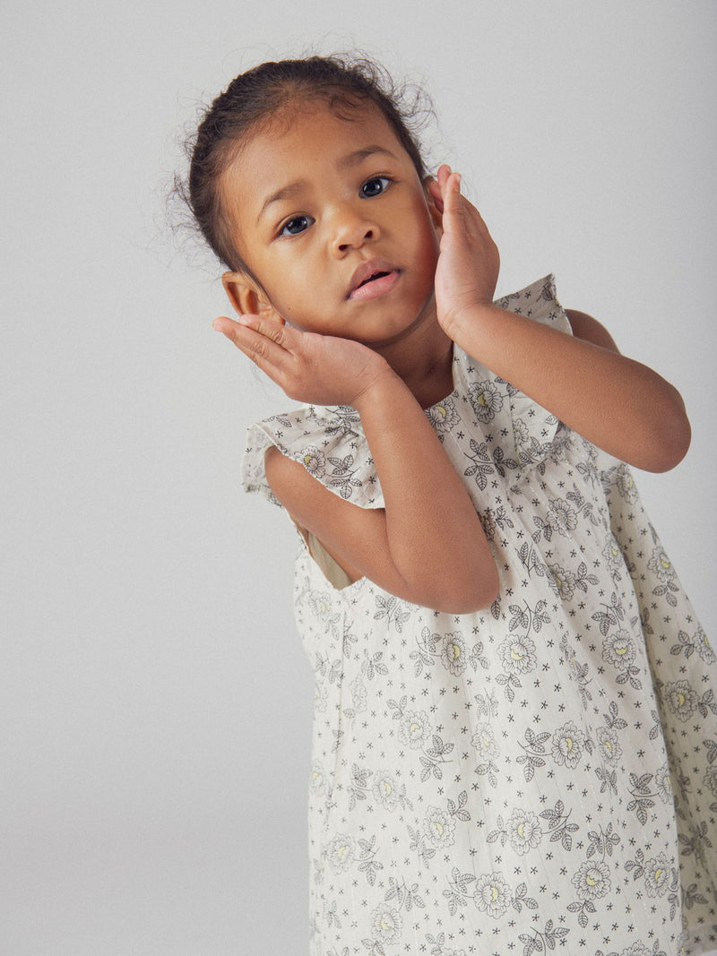Vestido floral para menina bebé com ombros com folhos e bloomer correspondente