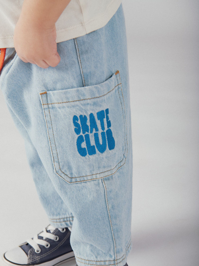 Calças em denim claro com cordão "Skate Party" para bebés rapazes