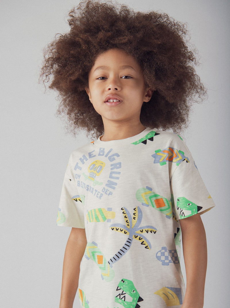 T-shirt ecru com estampa de dinossauro para rapazes
