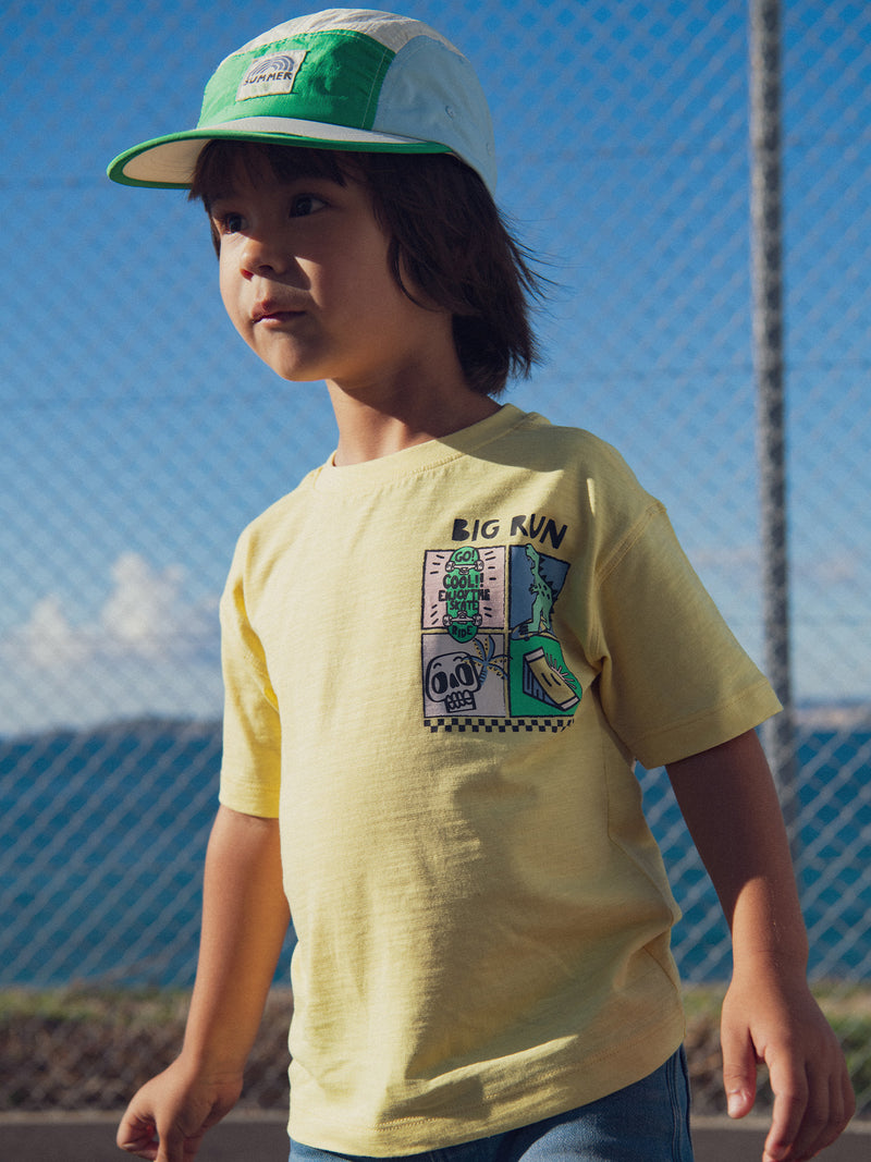 T-shirt amarela com animação de dinossauro para rapazes