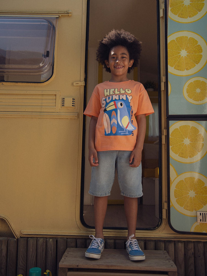 T-Shirt laranja com animação de tucano para rapazes
