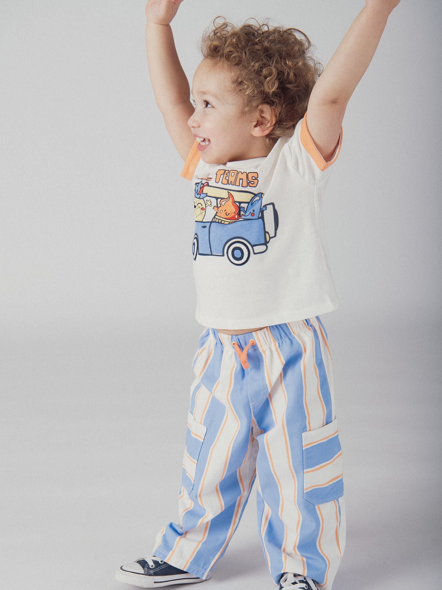 Pantalon rayé bleu et pêche pour bébé garçon